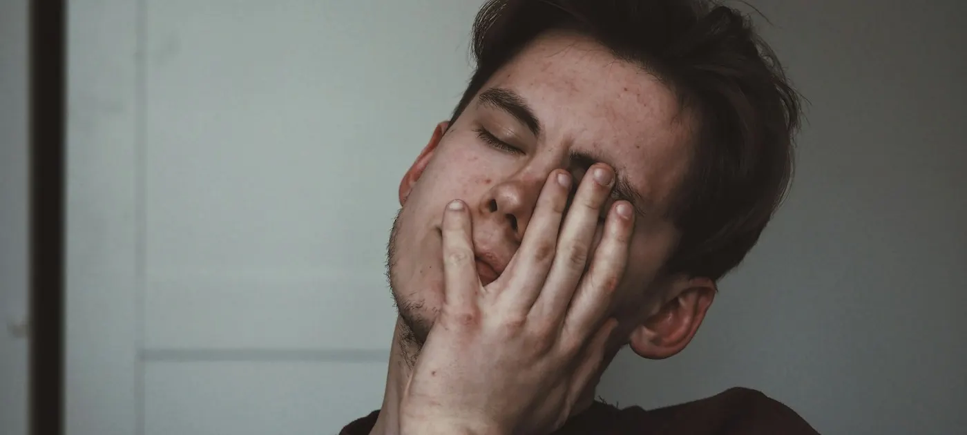 man wearing black crew-neck top