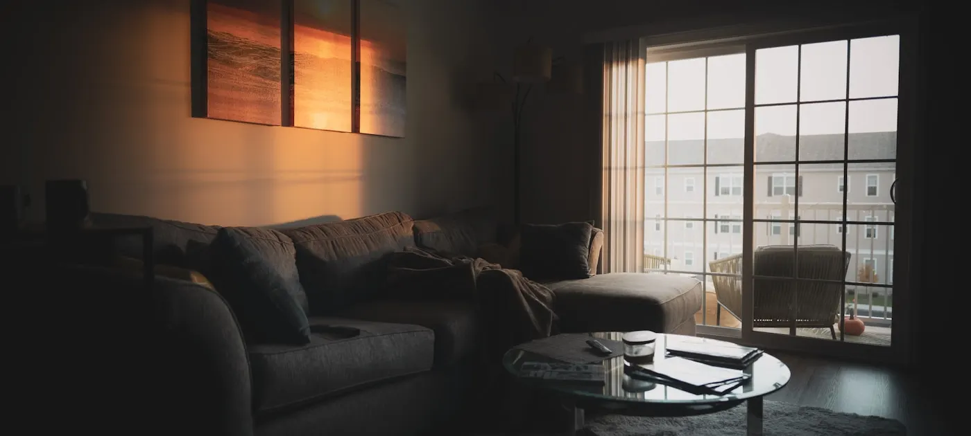 sectional sofa near coffee table and window